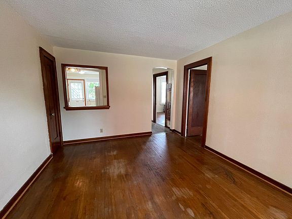 living room (floors to be sanded and revitalized)