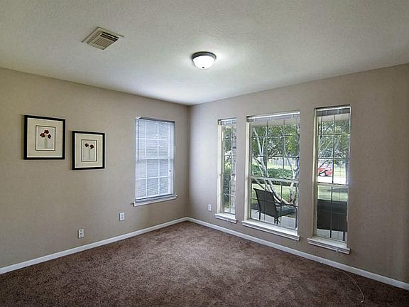  This dining room is nicely sized and a great place to enjoy meals with family and friends.