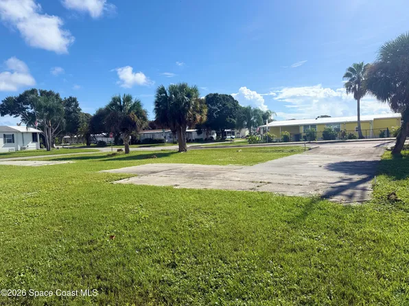 297 Egret Cir, Barefoot Bay, FL 32976