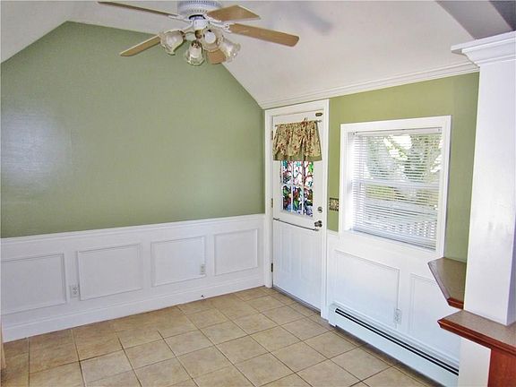 The Dining Area is Dressed with Chair Rail, Picture Frame and Crown Molding and Beautiful Columns! Ceramic Tile Floor and Anothe