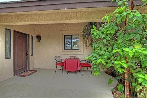 Gated courtyard entry.