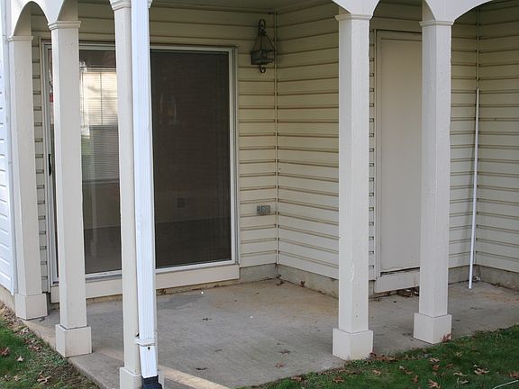 Patio off of den with storage closet access