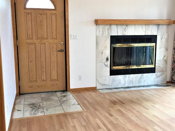 front door marble entry and fire place