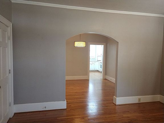 Arch living room to dining 