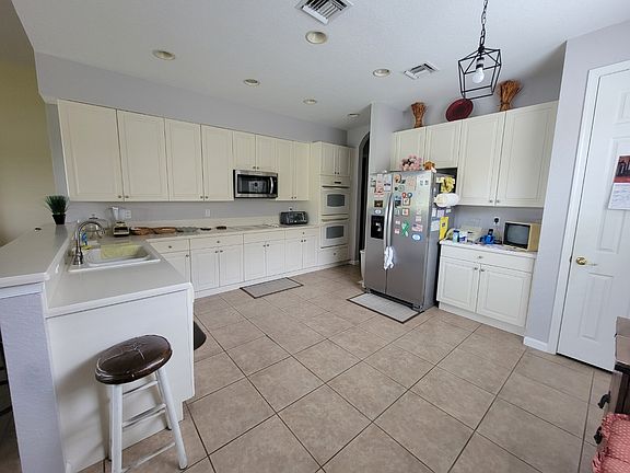 5th image of 1867 SW Jamesport Dr