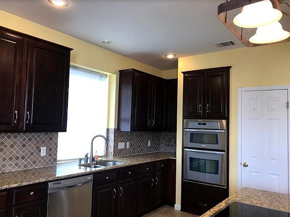 4th image of 8319 Fern Bluff Ave