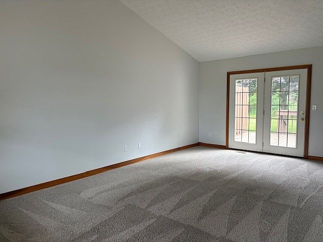 Great room w/ patio doors to private deck