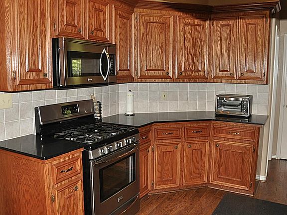 Gorgeous kitchen with ample cabinets and counter tops