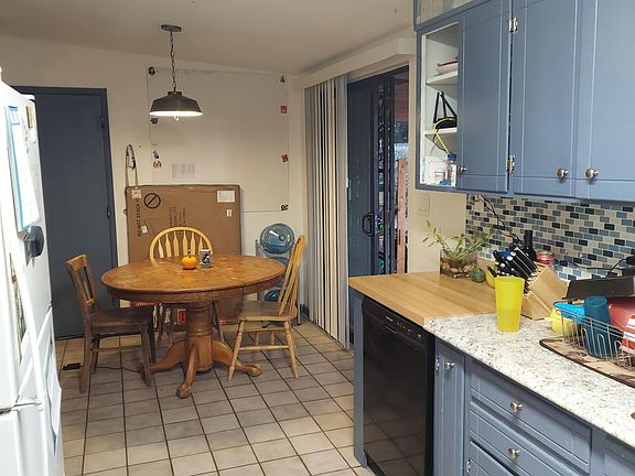 Kitchen and dining room, missing cabinet door will be repaired