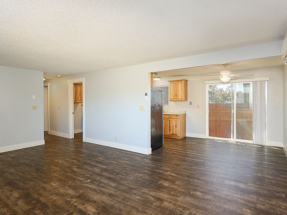 Living room looking to dinging and kitchen