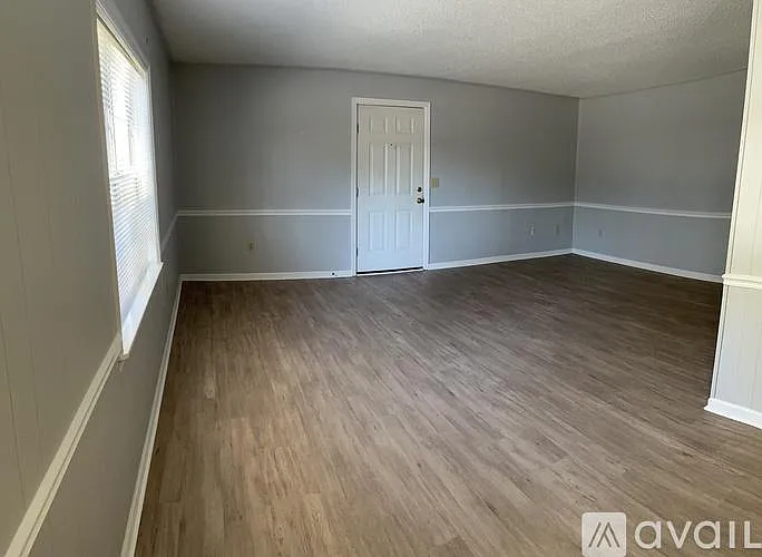 Den looking back toward Entry Hall door