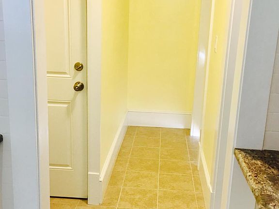 View from kitchen leading to front bedroom