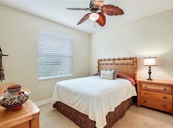 Guest Bedroom with Tommy Bahama Furniture and large closet
