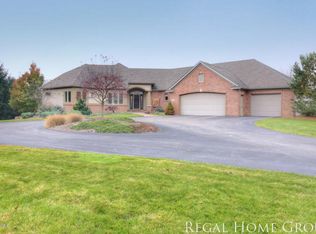 975 Cramton Ave NE, Ada, MI 49301