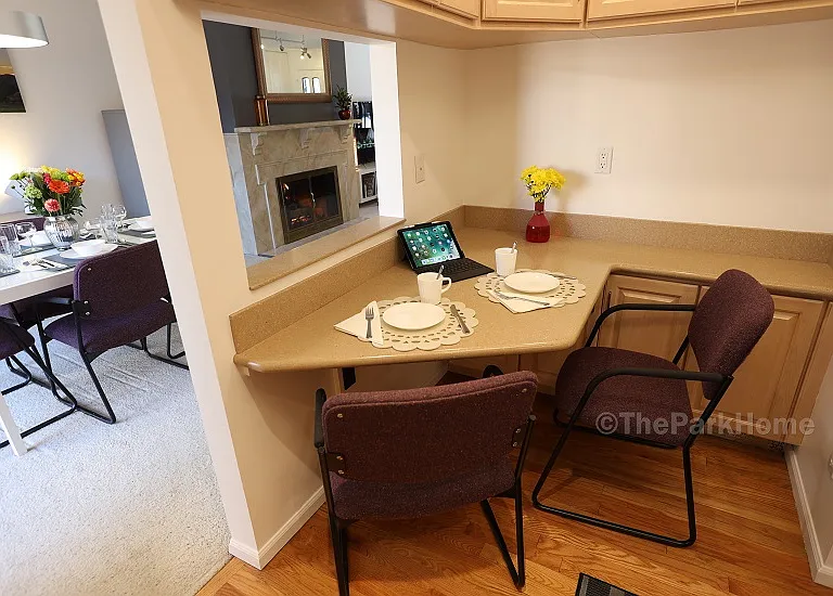 Kitchen nook: eat-space, work-space, storage-space.