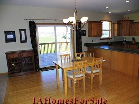 Dining Area is very large for entertaining. Add your own large table for 8. Beautiful bamboo flooring.  