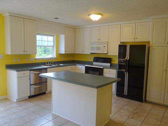Kitchen with island & pantry