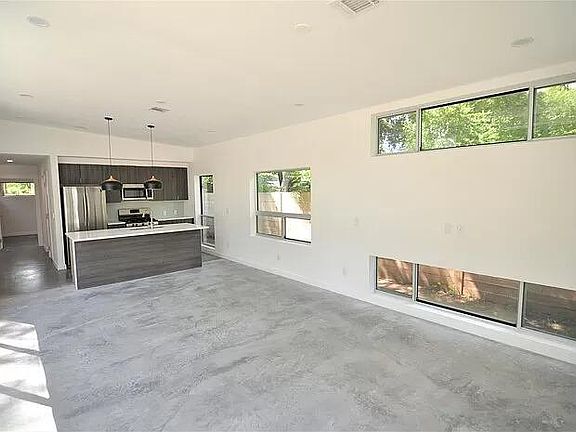 Entry view of living room and kitchen