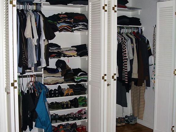 Walk-in closet with shelving