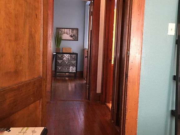 this photo shows off all the hardwood throughout the apartme