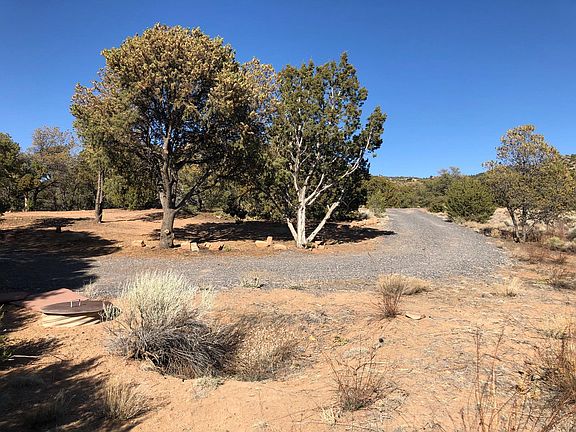 Approach to the property. Lots of extra parking.