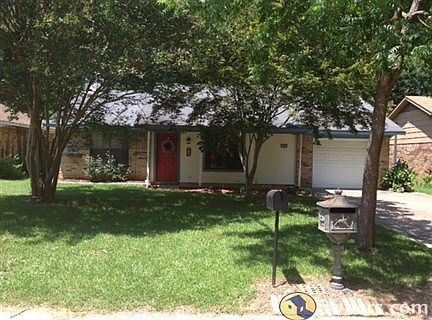 front view of house, yard, drive way