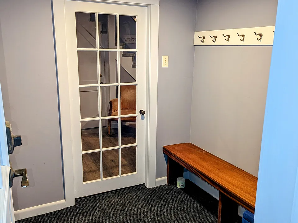 Private Entry Room Off Exterior Staircase Entrance Door With Window.