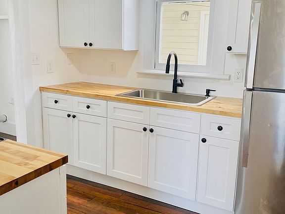New kitchen with white Shaker cabinets-self closing doors/drawers, stainless appliances