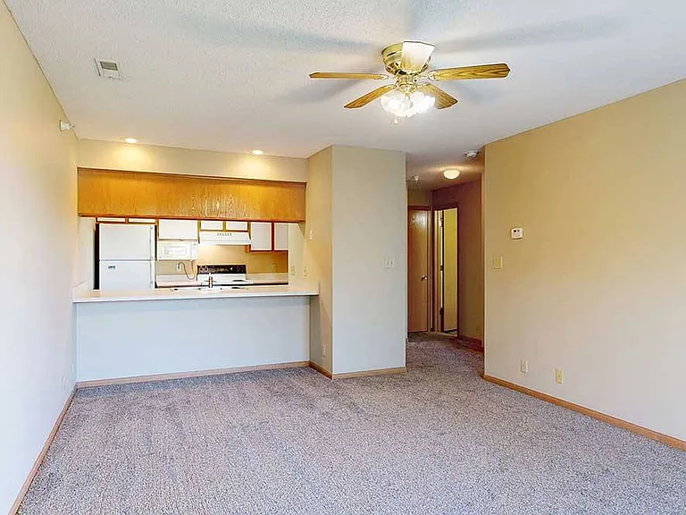 Open living areas connected to the kitchen create an inviting space where everyday meals, conversations, and downtime naturally come together.