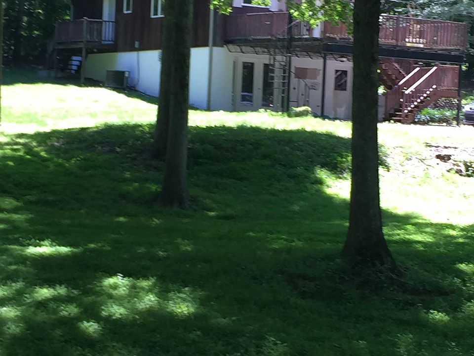 Three-story cabin in the woods