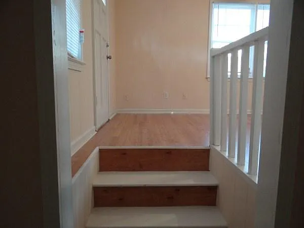 Stairs from lower level to living room