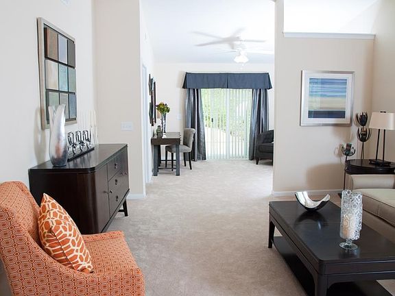 Open floorplan living with vaulted ceilings