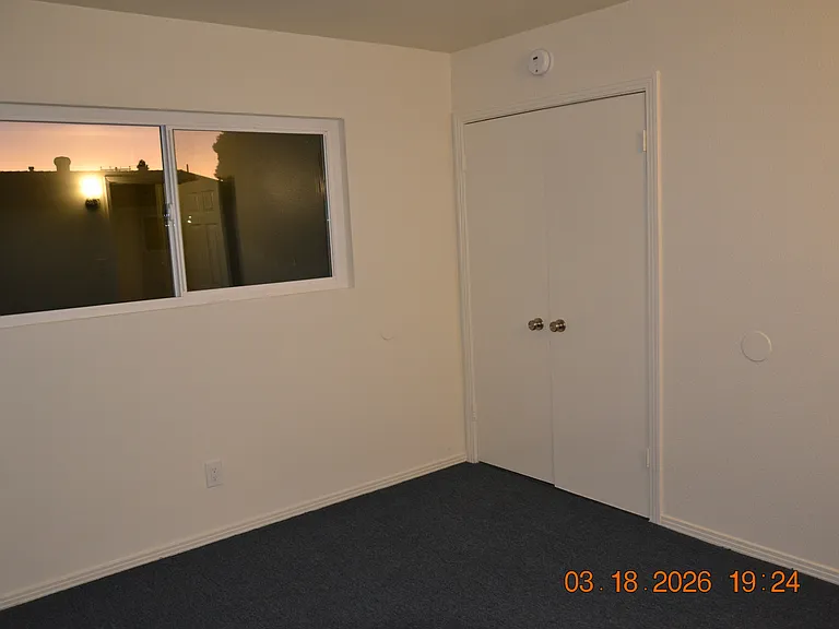 Front bedroom with walk-in closet.