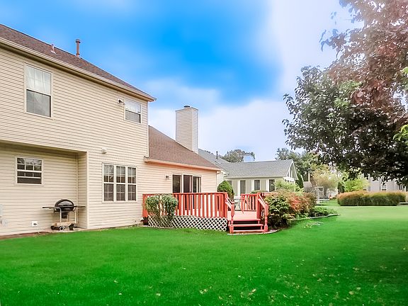 Large, spacious backyard with huge deck!