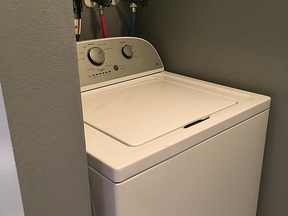 Laundry room full washer and dryers