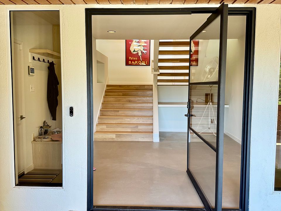 Entryway with no-stair access from attached garage and driveway.