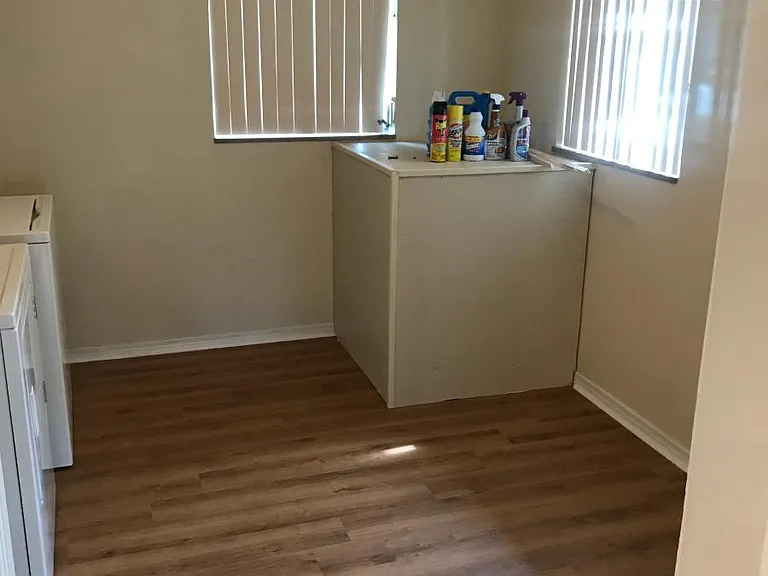 large laundry room with washer and dryer included