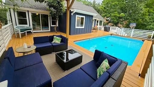 Relaxing, lakefront, outdoor seating area.