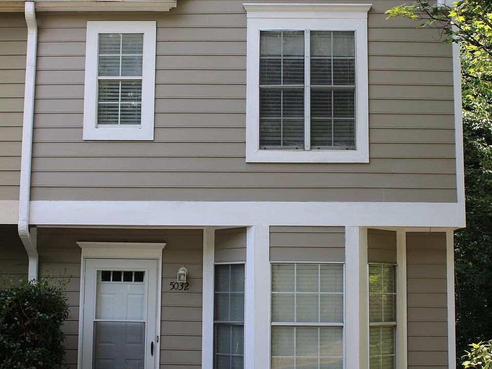 Front with new storm door and new paint