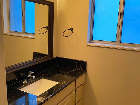 Granite top. Floor is not tile.