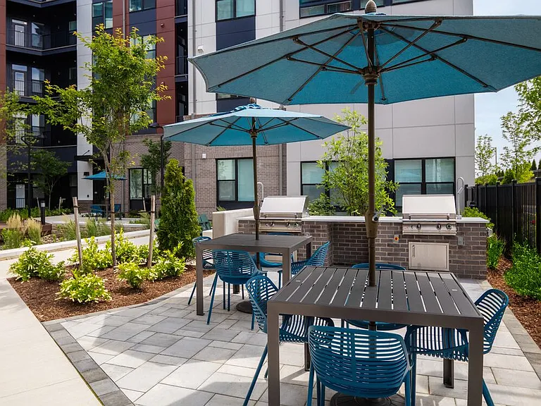 Courtyard #1 with fire pit, BBQ grills, and lounge areas