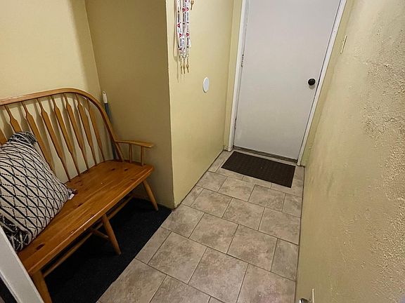 Private entrance with storage for winter jackets and boots