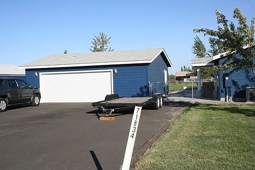 oversized two car garage (28 x 30) with asphalt driveway