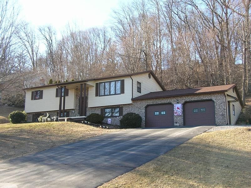LOCATED AT THE EDGE OF TOWN WITH A COUNTRY SETTING