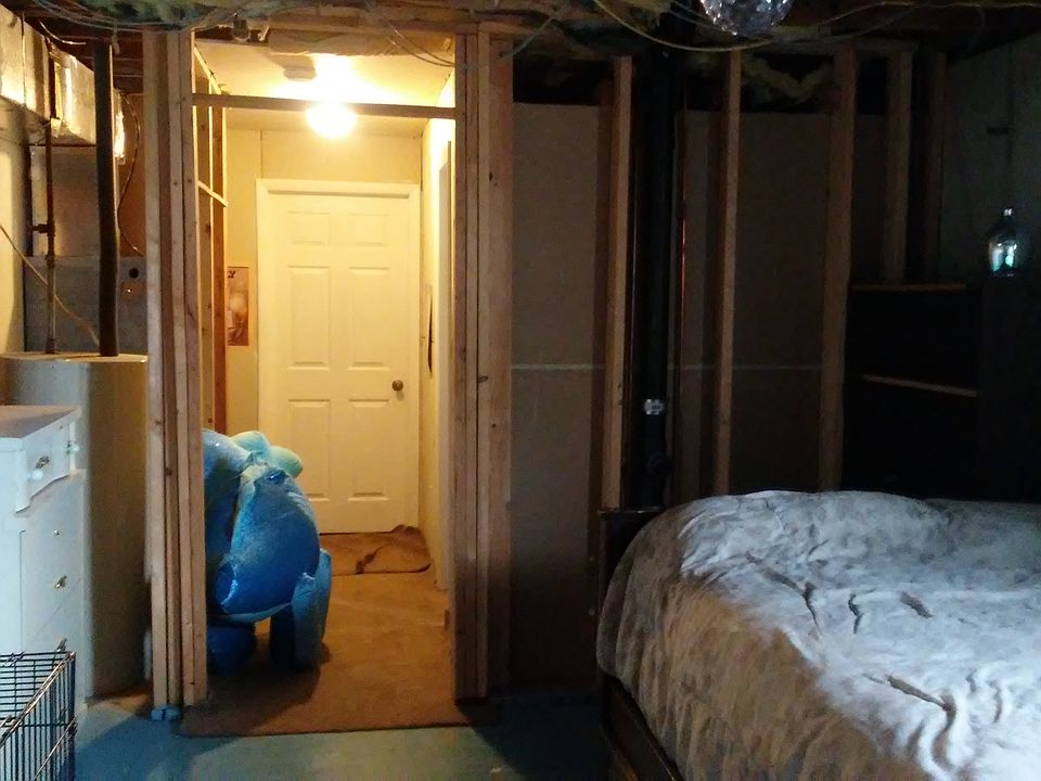 Unfinished basement room.