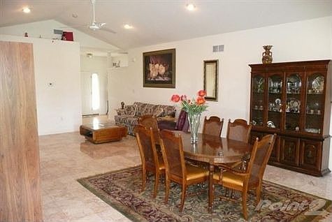 Dining Room with Vaulted Ceilings