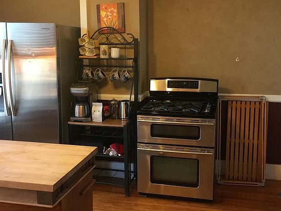 Kitchen, Jenn-Aire Dual oven, convection with gas burners. Butcher block island.
