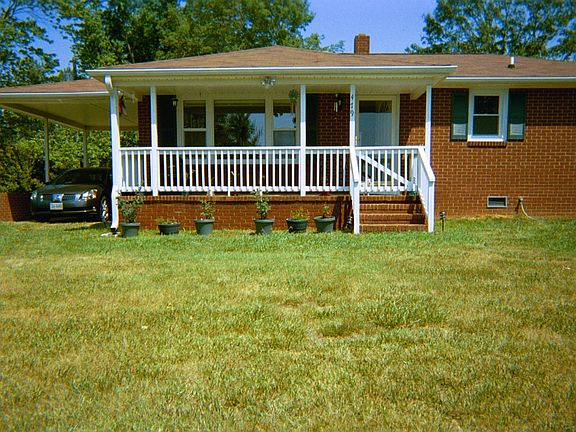 View of Carport & Left Side of House