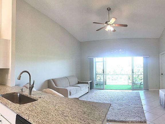 Kitchen opens to living room