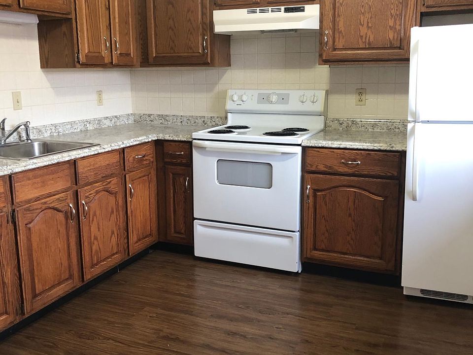 Renovated kitchen with hardwood flooring